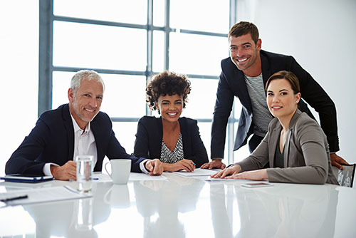 We got this. Cropped shot of corporate businesspeople in the boardroom